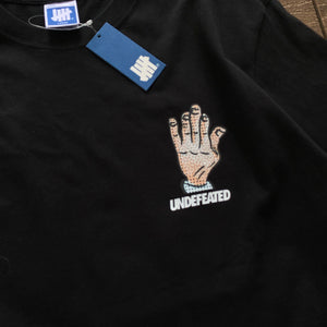 Camiseta UNDEFEATED Hand