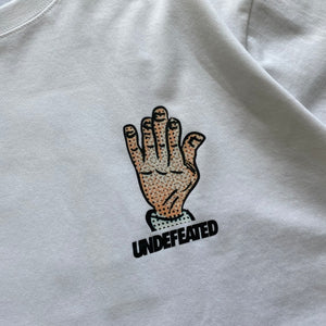 Camiseta UNDEFEATED Hand